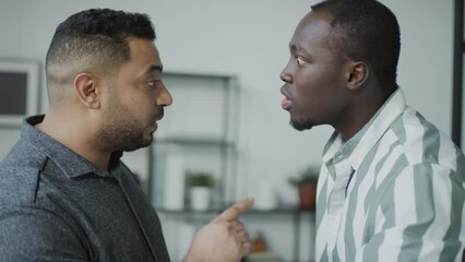 African American man bullying his Middle Eastern co-worker then the victim loosing patience and fighting back