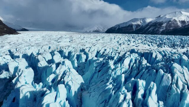 Perito Moreno Glacier At El Calafate In Patagonia Argentina. Nature Landscape. Glacier Background. Patagonia Argentina. Ice Berg Scenery. Perito Moreno Glacier At El Calafate In Patagonia Argentina.