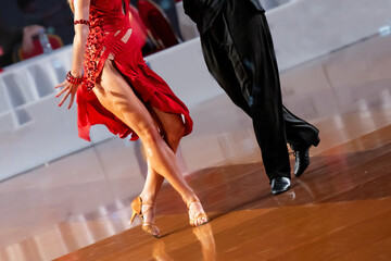 a couple dance a Latin dance. the legs of a dancing couple