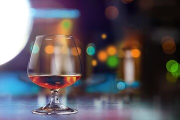 a glass of whiskey alcohol drink in the bar
