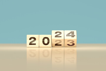 change 2023 year to 2024 year. happy new year concept background - wooden cubes. 3d render futur tomorrow