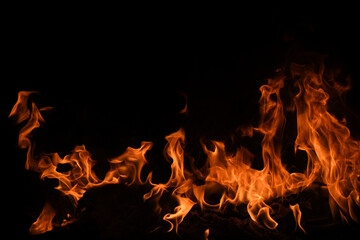 Fire flame burning and fire glowing on black background.