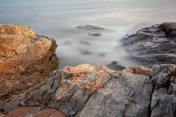 Sea crush on rock formation, long exposure