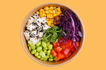 salad with green vegetable soybeans and tofu on a yellow background for a restaurant website, studio shooting