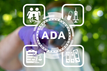 Doctor using virtual touch screen presses acronym: ADA. Medical concept of ADA Americans with...
