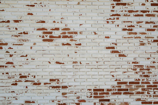 Fototapeta old white paint on red brick wall use as grounge background