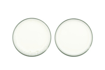 Glass of white milk isolated on transparent background, top view. PNG File format