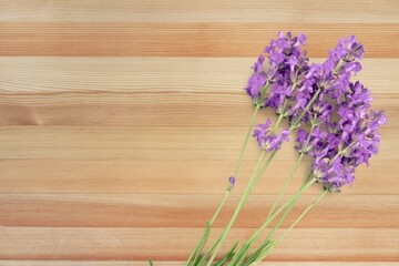 Beautiful aroma Lavender flowers on wooden background.