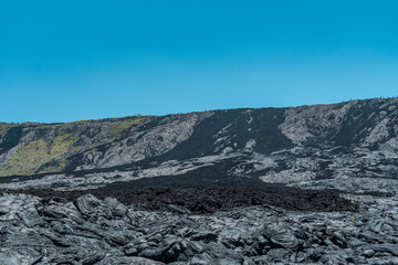 Fototapeta na wymiar Alanui Kahiko. Chain of Craters Road, Hawaii Volcanoes National Park. Pahoehoe and A'a Lava. volcanic rock