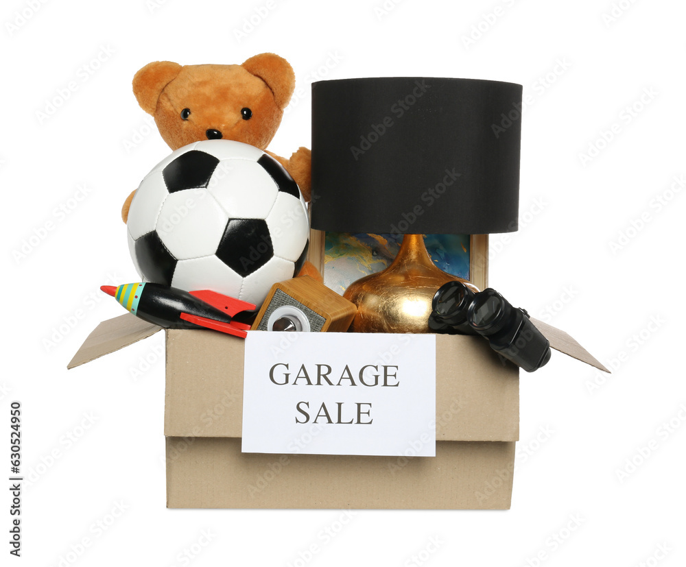 Wall mural Sign Garage Sale written on box with different stuff isolated on white