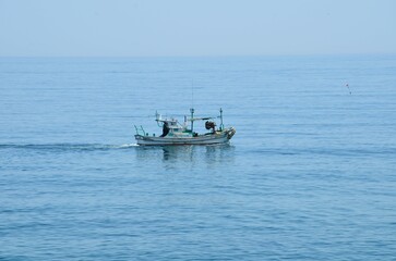 Naklejka na ściany i meble Fishing Boat off the Eastern Coast of South Korea near Sokcho