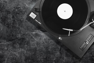 DJ turntable vinyl record on desk