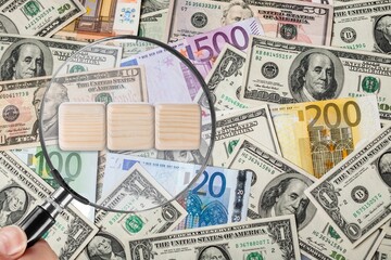 consumer price concept. magnifying glass and money