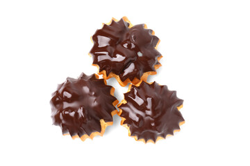 Delicious profiteroles with chocolate spread isolated on white, top view