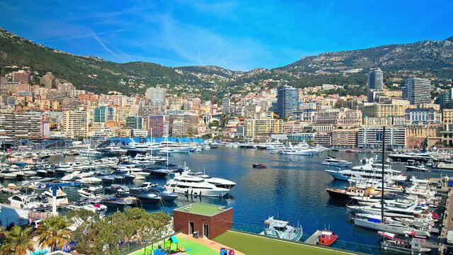 Stunning view of Port Hercule in Monaco, France. View of luxury sailboats, ships, and yachts, deep-water port since ancient time in the South of France, French Riviera.