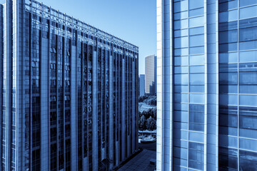 Modern architecture of financial districts with aerial blue background