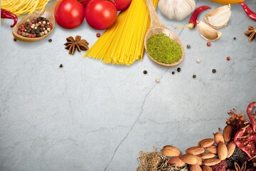 Food background with aroma spices, herbs on desk