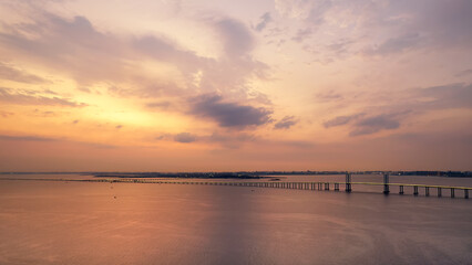 Fototapeta na wymiar Aerial photo of Qingdao Jiaozhou Bay Cross Sea Bridge under sunset..