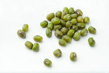 close up of green mung beans isolated on white background.