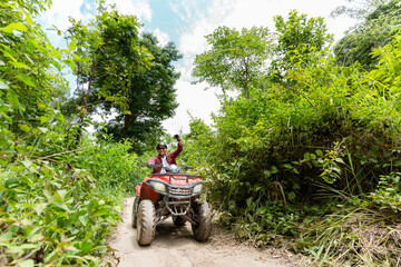Summer Activities for adults - a trip on quad bikes on the dirt road.