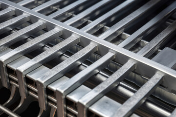 Extreme close-up of a cable tray's cross-section showing its sturdy construction and efficient design