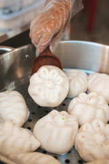 Baozi or Chinese Steamed Buns is a type of yeast-leavened filled bun in various Chinese cuisines.