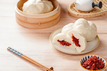 Baozi or Chinese Steamed Buns is a type of yeast-leavened filled bun in various Chinese cuisines.