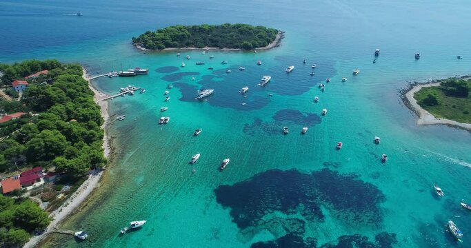 Blue lagoon (Krknjasi bay) in Croatia from above. Aerial approach video. 