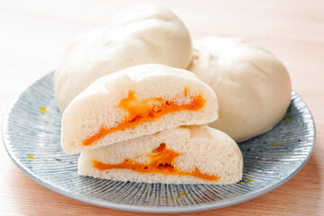 Baozi or Chinese Steamed Buns is a type of yeast-leavened filled bun in various Chinese cuisines.