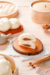 Baozi or Chinese Steamed Buns is a type of yeast-leavened filled bun in various Chinese cuisines.