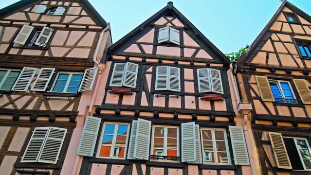 Traditional colourful wooden timbered houses in Colmar the Grand Est of France. Beautiful Renaissance medieval buildings with Cobblestone streets bordering Germany