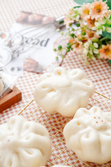 Baozi or Chinese Steamed Buns is a type of yeast-leavened filled bun in various Chinese cuisines.