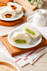 Baozi or Chinese Steamed Buns is a type of yeast-leavened filled bun in various Chinese cuisines.