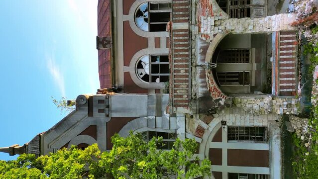 Drone vertical view of the Pommer Mansion in Taul, Moldova. Old abandoned building entrance and facade