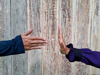 Woman refusing to shake hand of man