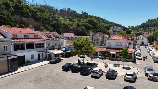 Drone shot reversing out from Porto Brandao and out over the river.