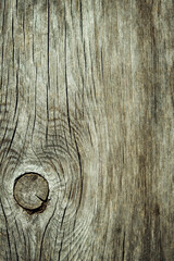 Grey wooden background. Close-up texture of an old gray plank. Mock up for design, copy space.
