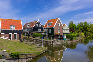 Fototapeta na wymiar Colorful typical Dutch style homes in beautiful Marken island, North Netherlands.