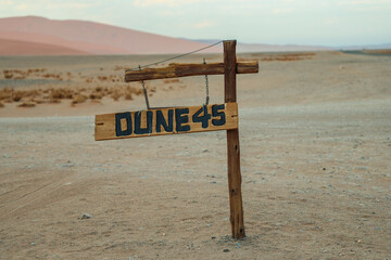Wooden Dune 45 sign in desert of Sossusvlei Namibia