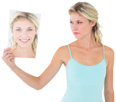 Digital png photo of angry caucasian woman holding portrait on transparent background - Powered by Adobe