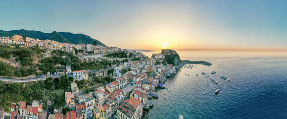 Panoramic view of Scilla with blue sea and castle Ruffo on the rocks, Calabria, Italy