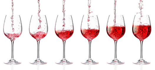 Pouring pink wine into a glass on a white background.