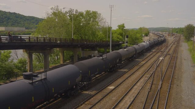 train cars and oil tankers traveling the railroad tracks in Pennsylvania