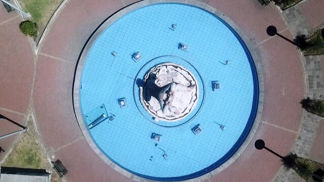 Monument To Thirst Fountain At The Eduardo Kingman Park In Quito, Ecuador. aerial topdown rotate