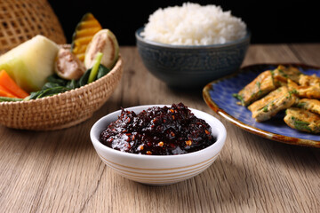 pork shrimp chilli dip local thai food sauce isolated in wood background
