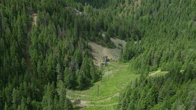 Aerial looking down on ski run and chair lift in summer in northern Idaho
