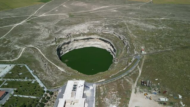 Drone footage of sinkhole formations, deep valleys, natural scenery on Earth. Erosion and the environment. Konya Karapinar district