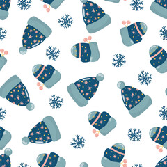 Winter seamless pattern with hat, mittens and snowflakes. On a white background, in a hand-drawn style.