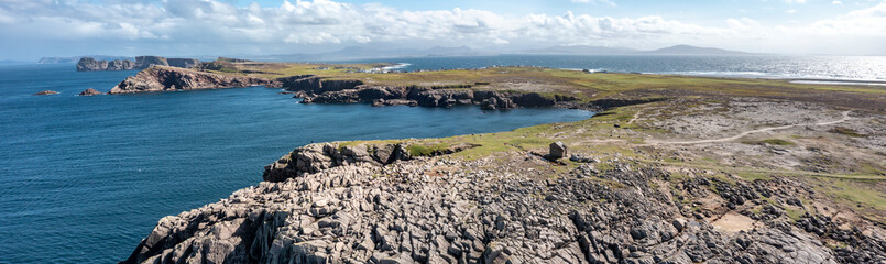 The cliffs and sea stacks on Tory Island, County Donegal, Ireland © Lukassek