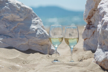 glass of champagne on the beach